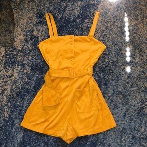 Yellow suede button up romper with pockets